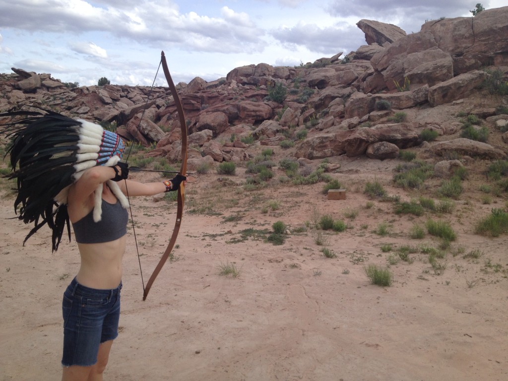 Practicing archery with some costuming and a home-made weasel target.