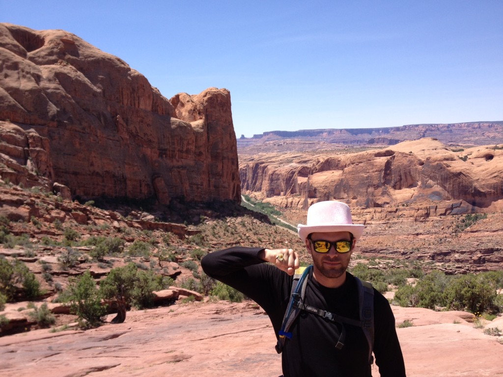 Climbing to the top of Moab Rim Trail to juggle and wand.