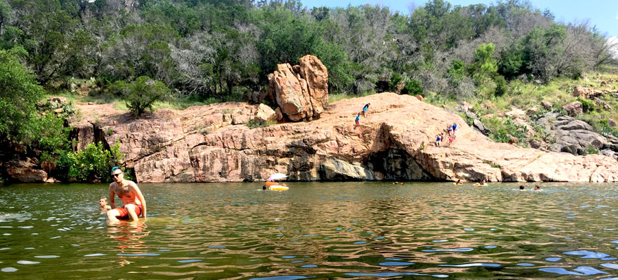 Swimming at Devil's Waterhole in Inks Lake State Park.