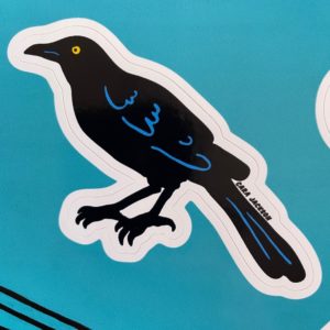 Detail image of grumpy black bird sticker.