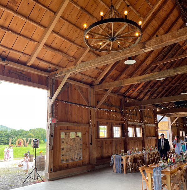A large barn decorated for a wedding.