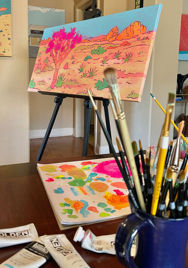 Painting in-progress with palette and brushes in foreground.